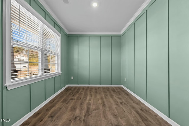 110 Lodgepole Ln, Burlington, NC 27215 - unfurnished room with ornamental molding, dark wood-style flooring, and a decorative wall