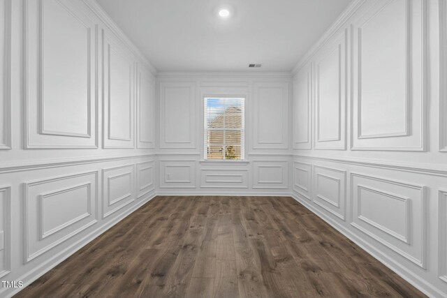110 Lodgepole Ln, Burlington, NC 27215 - interior space featuring dark wood-style flooring, visible vents, and a decorative wall