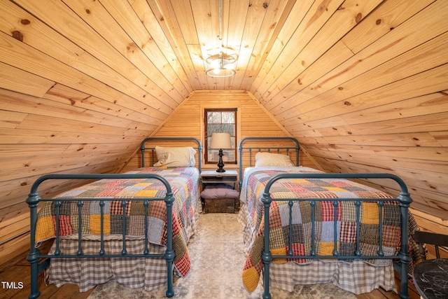 bedroom featuring wood walls, wood ceiling, and vaulted ceiling