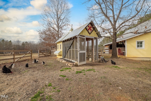 view of poultry coop with fence