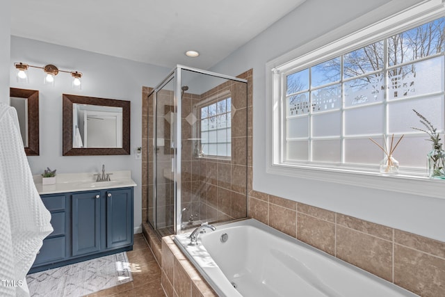 full bath with recessed lighting, a garden tub, a shower stall, and vanity