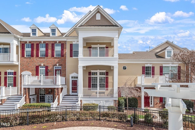 view of property featuring a fenced front yard