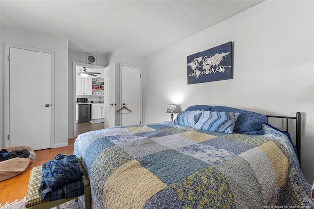 bedroom with wood finished floors