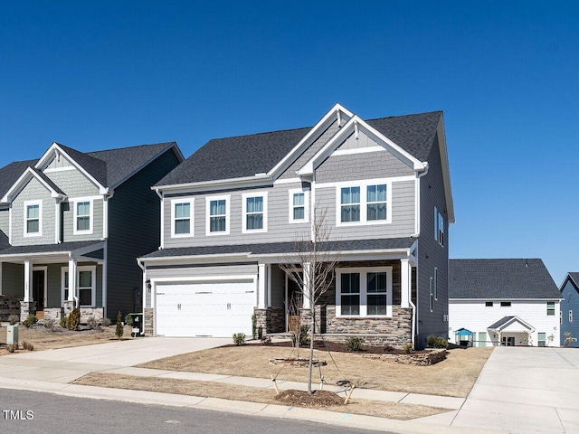 craftsman inspired home featuring a porch, a shingled roof, concrete driveway, a garage, and stone siding