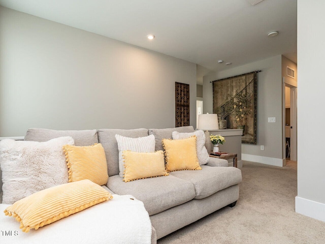 living room featuring recessed lighting, carpet, visible vents, and baseboards