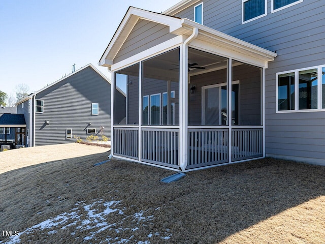 view of home's exterior featuring a sunroom