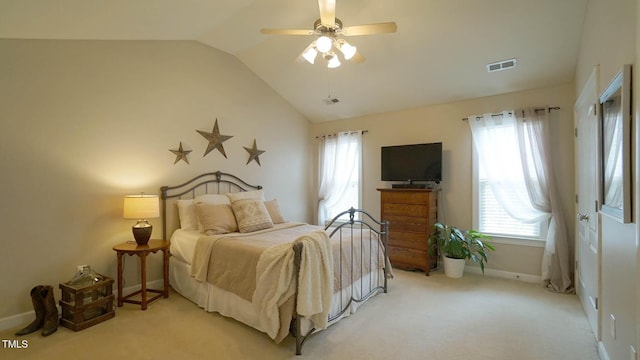 bedroom featuring visible vents, light colored carpet, lofted ceiling, and ceiling fan
