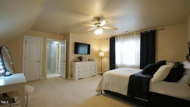bedroom featuring baseboards, light colored carpet, visible vents, and ceiling fan