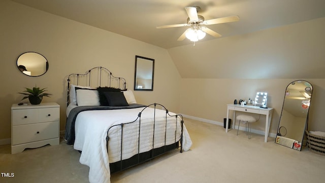 bedroom with baseboards, a ceiling fan, carpet, and vaulted ceiling