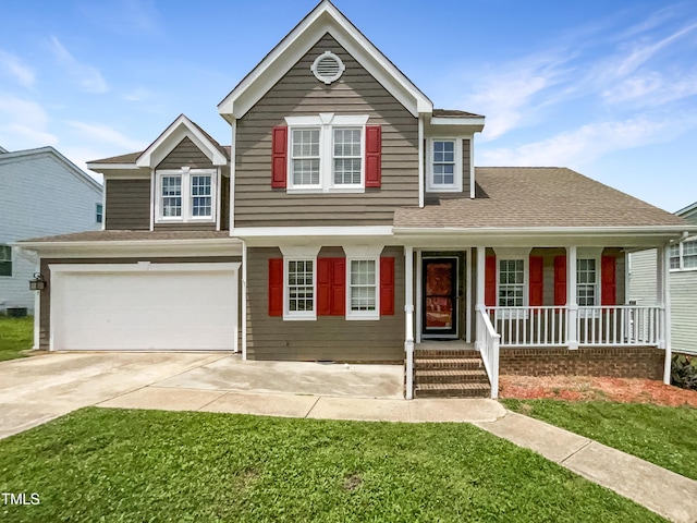 5317 Tifton Dr, Raleigh, NC 27610 - traditional-style house featuring covered porch, driveway, a garage, a front lawn, and a shingled roof