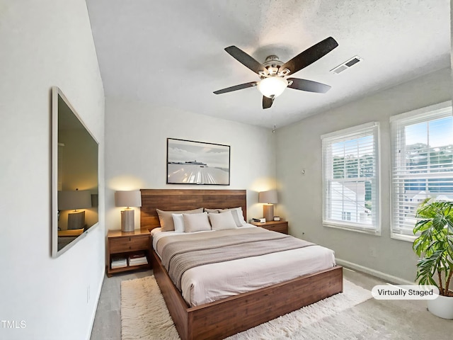 5317 Tifton Dr, Raleigh, NC 27610 - carpeted bedroom featuring baseboards and ceiling fan