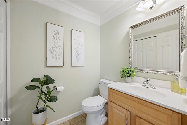 half bathroom featuring tile patterned flooring, toilet, vanity, baseboards, and ornamental molding