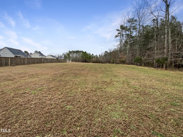 view of yard featuring fence