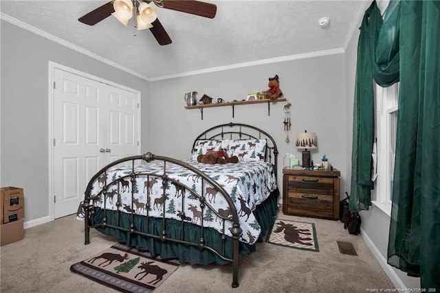 bedroom featuring ornamental molding, light colored carpet, ceiling fan, and baseboards