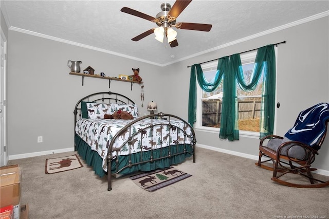 carpeted bedroom with crown molding, a textured ceiling, and baseboards