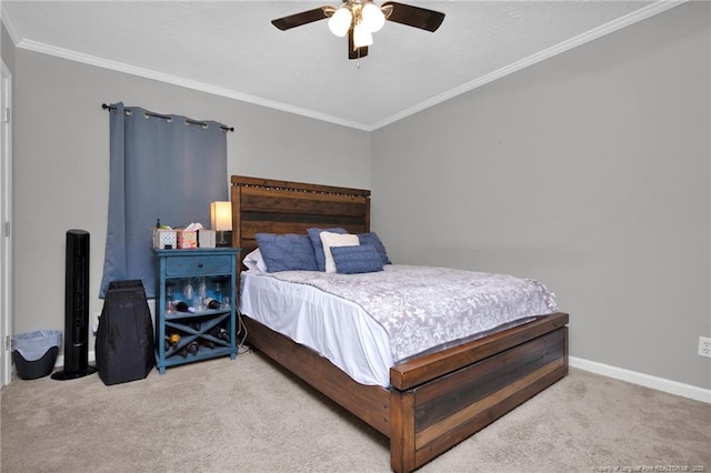 bedroom with light carpet, ornamental molding, and baseboards