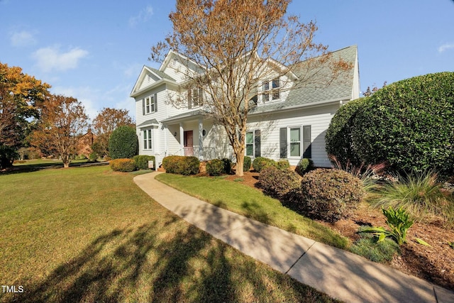 view of front of home with a front yard