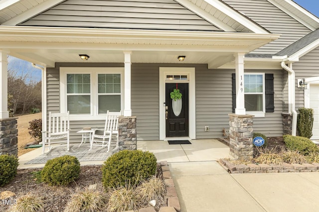 property entrance with a porch