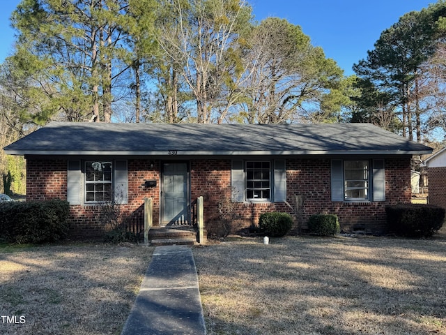 ranch-style house with brick siding