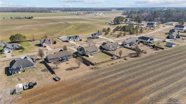 birds eye view of property featuring a residential view and a rural view