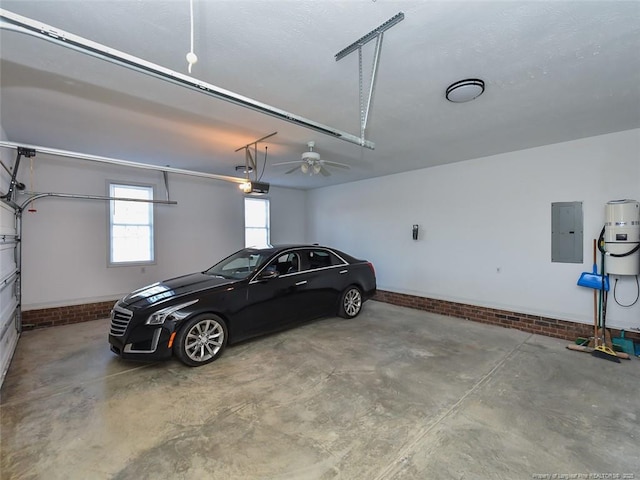 garage with electric panel and a garage door opener