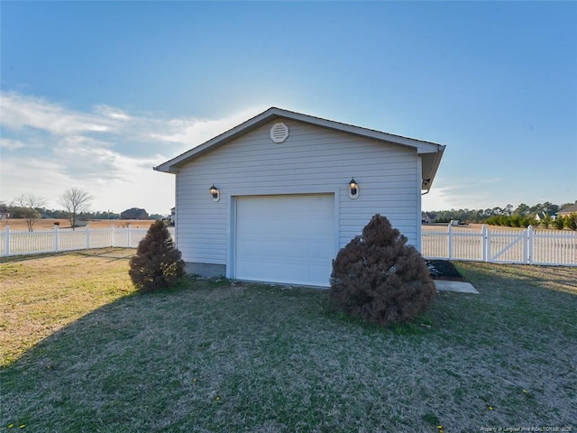 garage with fence