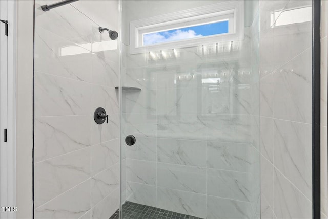 bathroom featuring a stall shower