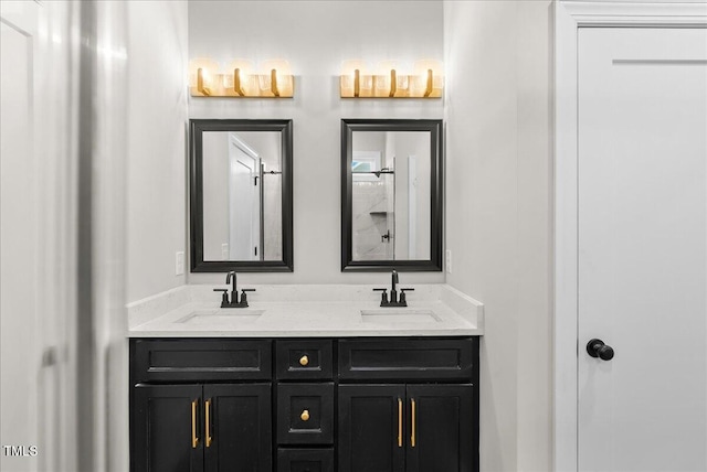 bathroom featuring a sink and double vanity