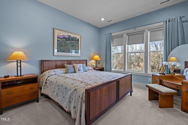 bedroom with recessed lighting, visible vents, and light colored carpet