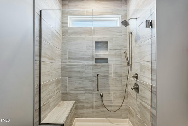 bathroom featuring a stall shower