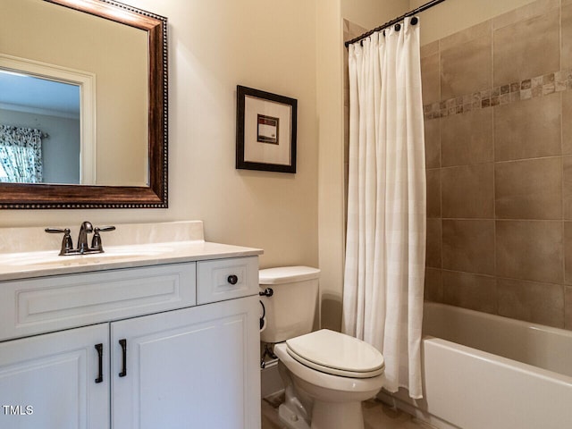 full bathroom with shower / bath combo, vanity, and toilet