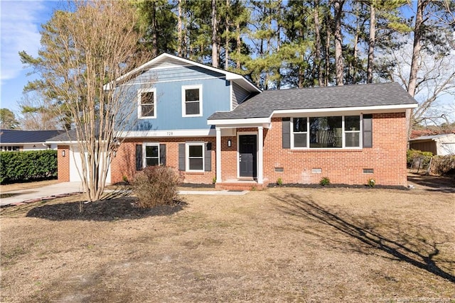 tri-level home featuring brick siding, concrete driveway, an attached garage, crawl space, and a front lawn