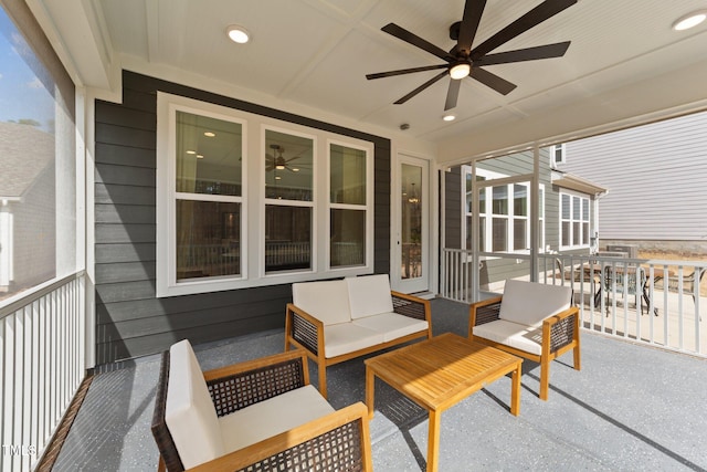 view of patio with a ceiling fan, outdoor dining space, and an outdoor living space