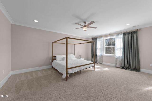 unfurnished bedroom featuring recessed lighting, ornamental molding, light carpet, ceiling fan, and baseboards