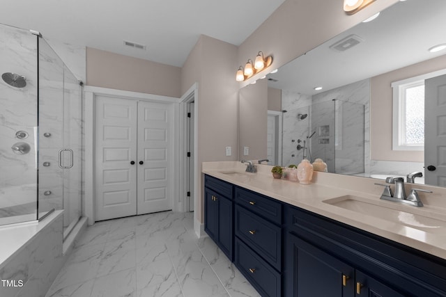 full bathroom with marble finish floor, visible vents, and a sink