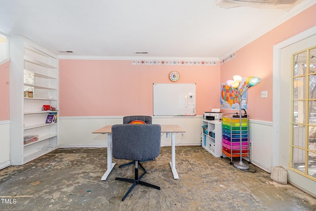 home office featuring visible vents, crown molding, and wainscoting