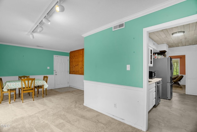 214 Woodcrest Ave, Smithfield, NC 27577 - dining area with wainscoting, crown molding, and track lighting