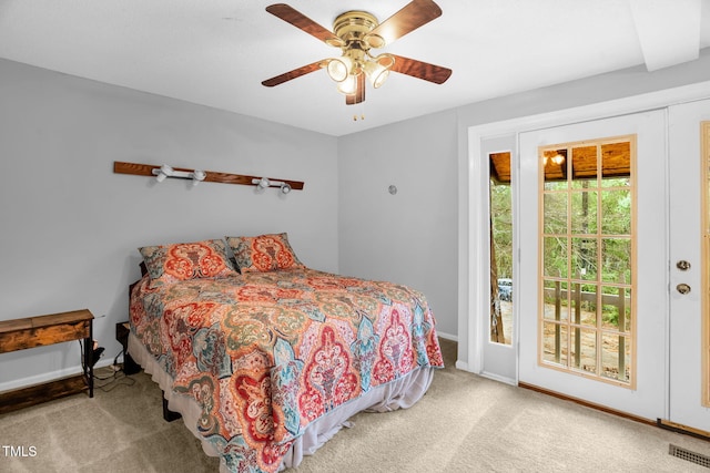 214 Woodcrest Ave, Smithfield, NC 27577 - carpeted bedroom with access to outside, baseboards, and ceiling fan
