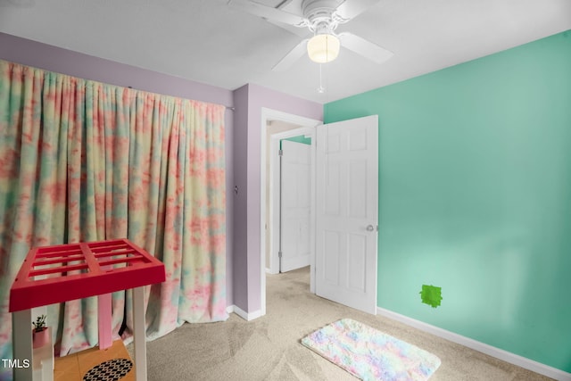 214 Woodcrest Ave, Smithfield, NC 27577 - unfurnished bedroom with carpet flooring, baseboards, and a ceiling fan