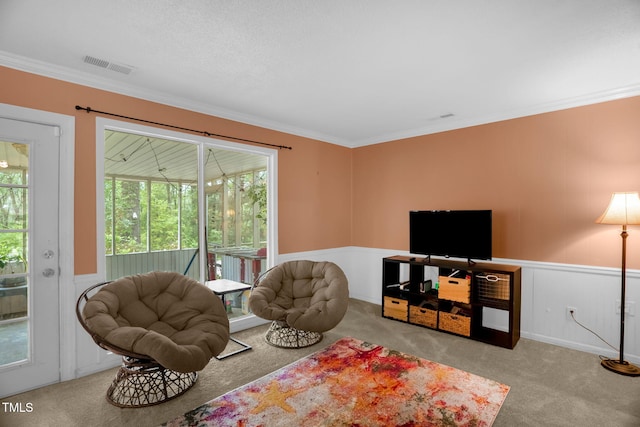 214 Woodcrest Ave, Smithfield, NC 27577 - living room with carpet flooring, ornamental molding, and a wainscoted wall