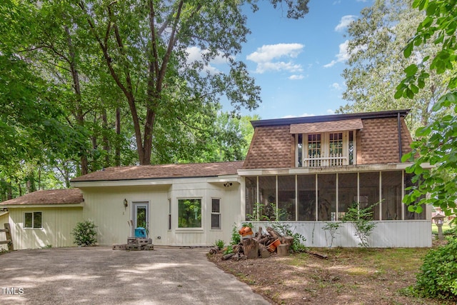 214 Woodcrest Ave, Smithfield, NC 27577 - view of front of property featuring a sunroom and roof with shingles