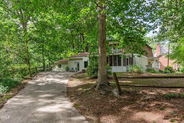 214 Woodcrest Ave, Smithfield, NC 27577 - view of front of house with a sunroom and concrete driveway