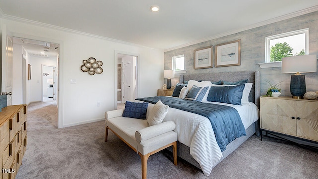 bedroom featuring light carpet, baseboards, ornamental molding, and attic access