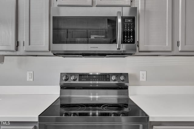 kitchen with stainless steel appliances and light countertops