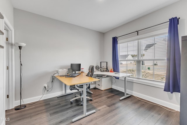 home office with wood finished floors and baseboards