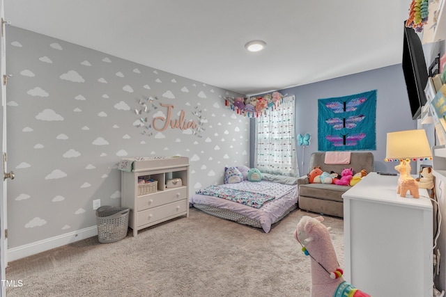 carpeted bedroom with baseboards and wallpapered walls