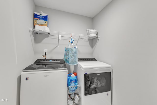 laundry room with laundry area and independent washer and dryer