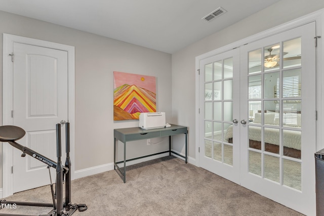 doorway to outside with baseboards, visible vents, carpet flooring, and french doors