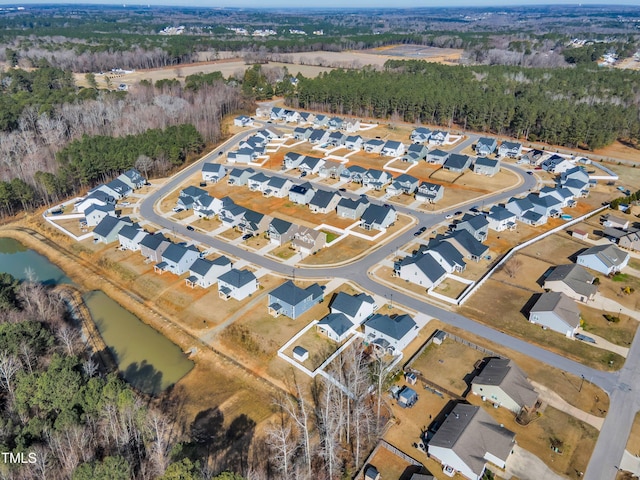 aerial view featuring a residential view and a water view