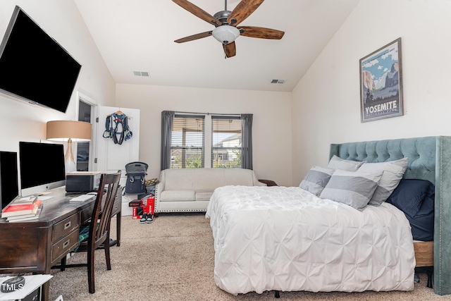 bedroom featuring lofted ceiling, visible vents, and light colored carpet